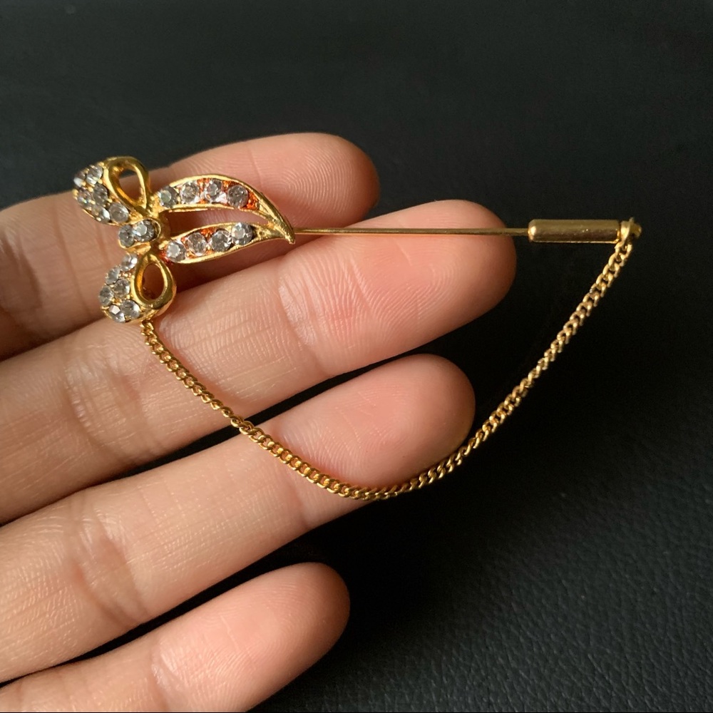 Vintage ribbon gold brooch/pin